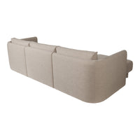 Neutral beige sofa with smooth, minimalist design and subtle texture, perfect for modern living spaces.