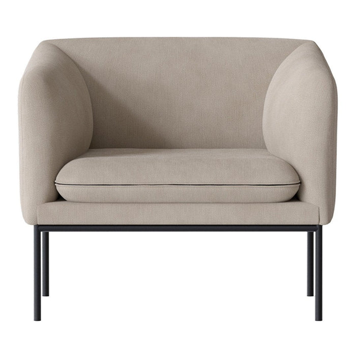 Beige upholstered armchair with a smooth finish and minimalist black metal legs. Simple, modern design elements.