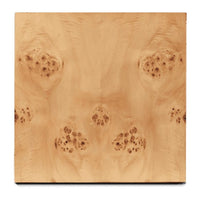 Light honey-colored wood with intricate, swirling patterns and dark, speckled accents. Ideal for chic home decor.
