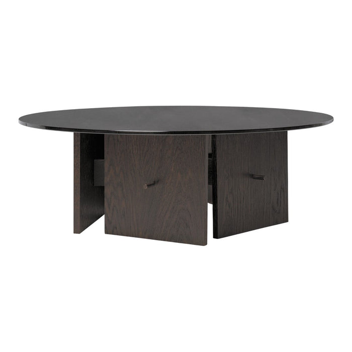 Round coffee table in dark wood finish with smooth surface and minimalist geometric design.