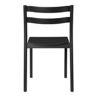 Black dining chair with a sleek, minimalist design and subtle horizontal slat pattern on the backrest.
