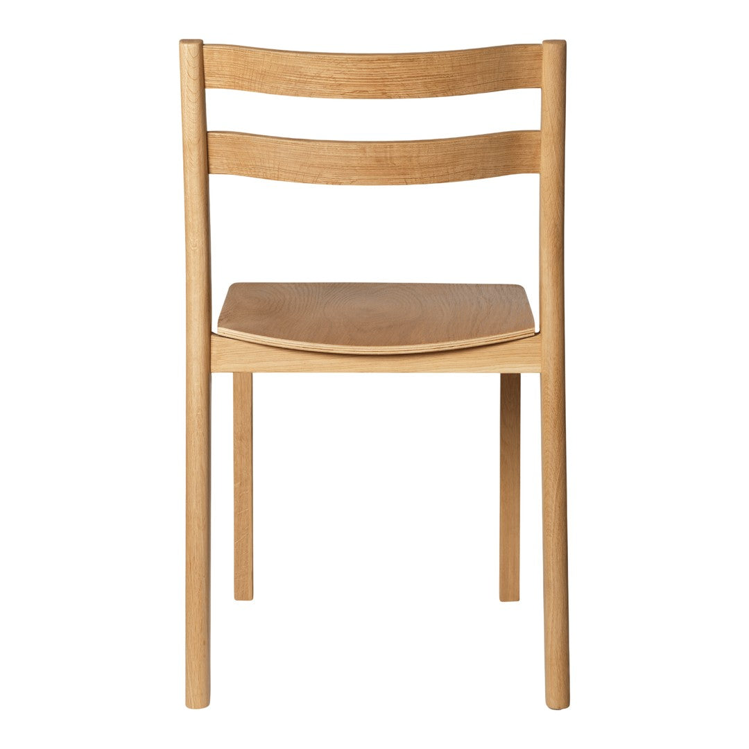 Light natural wood chair with smooth, minimalist design and subtle grain patterns. Perfect for modern decor.