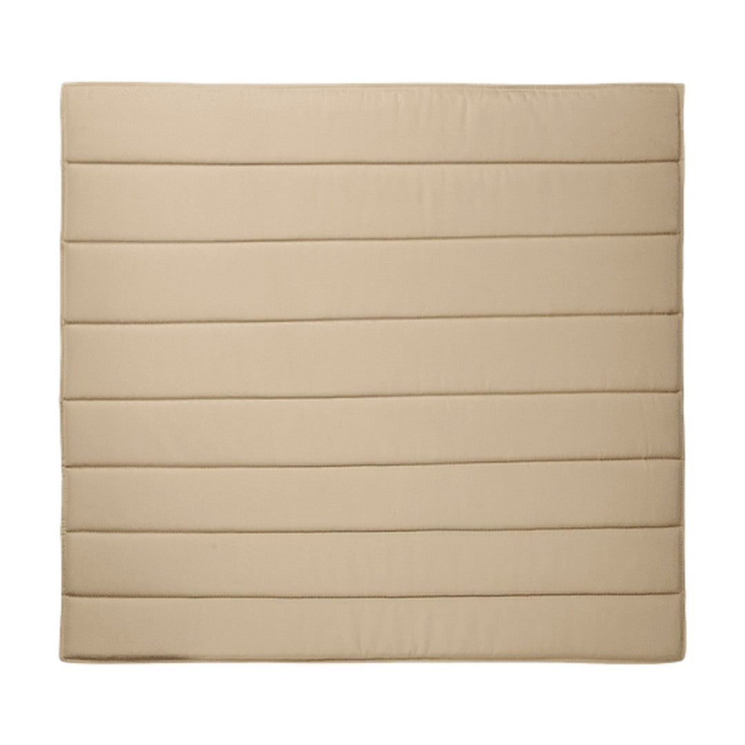 Beige quilted square cushion with subtle horizontal stripes, adding texture and warmth to any space.