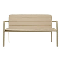 Beige upholstered loveseat with horizontal stitching and a light metal frame for modern decor.