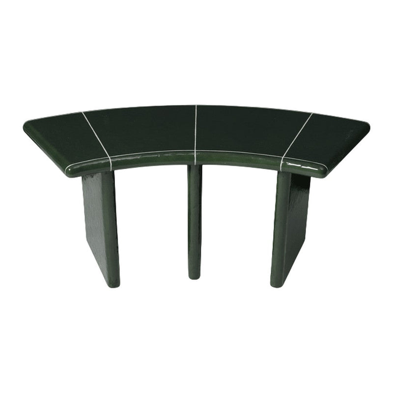 Curved green table with sleek black accents and a glossy finish, perfect for modern decor.