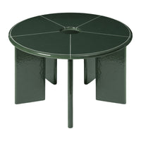 Round, dark green table with a smooth finish and geometric, segmented pattern on the surface.