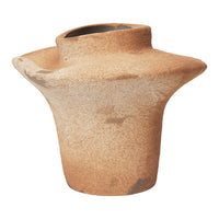 Artisan beige ceramic vase with a textured, rustic finish and a unique, sculptural shape. Ideal for modern decor.