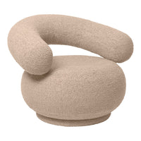 Beige boucle armchair with a curved design and soft, textured fabric, perfect for adding a modern touch to any space.