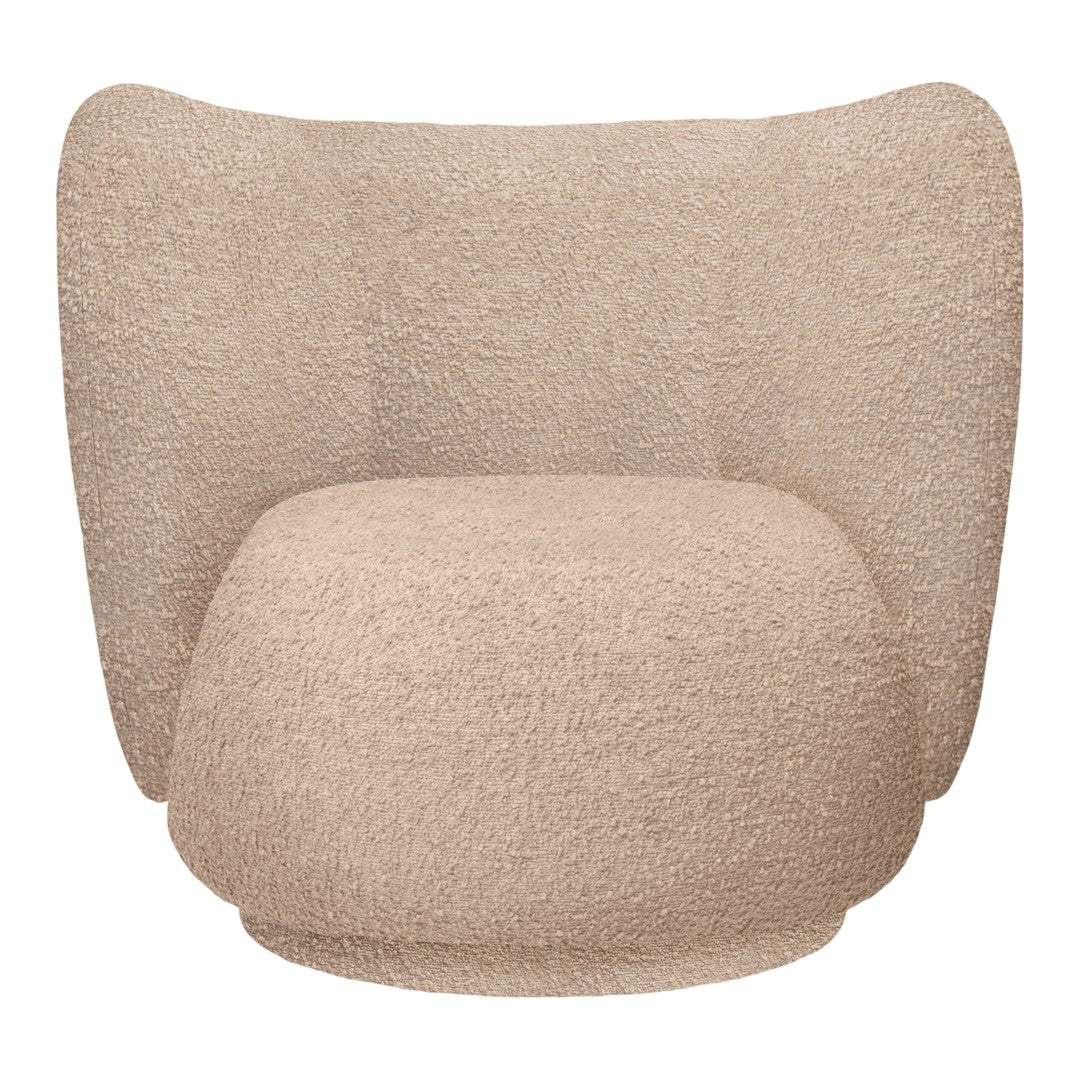 Beige textured armchair with soft, cozy fabric and curved, inviting silhouette. Perfect for modern interiors.