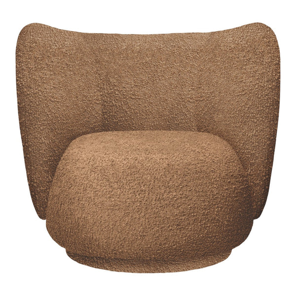 Soft brown textured accent chair with rounded edges and a cozy, inviting design. Perfect for modern interiors.