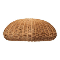 Natural woven rattan cushion in warm brown tones with a curved, textured design. Perfect for a cozy home aesthetic.