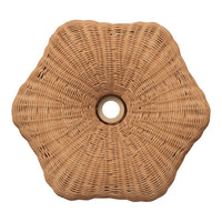 Woven rattan table in a hexagonal shape, featuring a natural tan color with a textured, intricate pattern.
