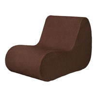 Brown curved lounge chair with a smooth, contemporary design and textured fabric. Perfect for modern interiors.