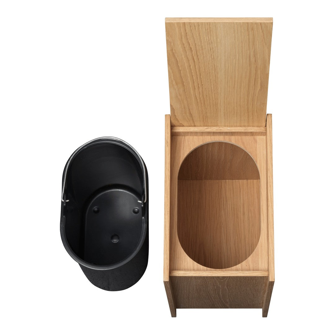 "Natural wood finish with a light oak grain pattern and a sleek black cylindrical liner for modern decor."