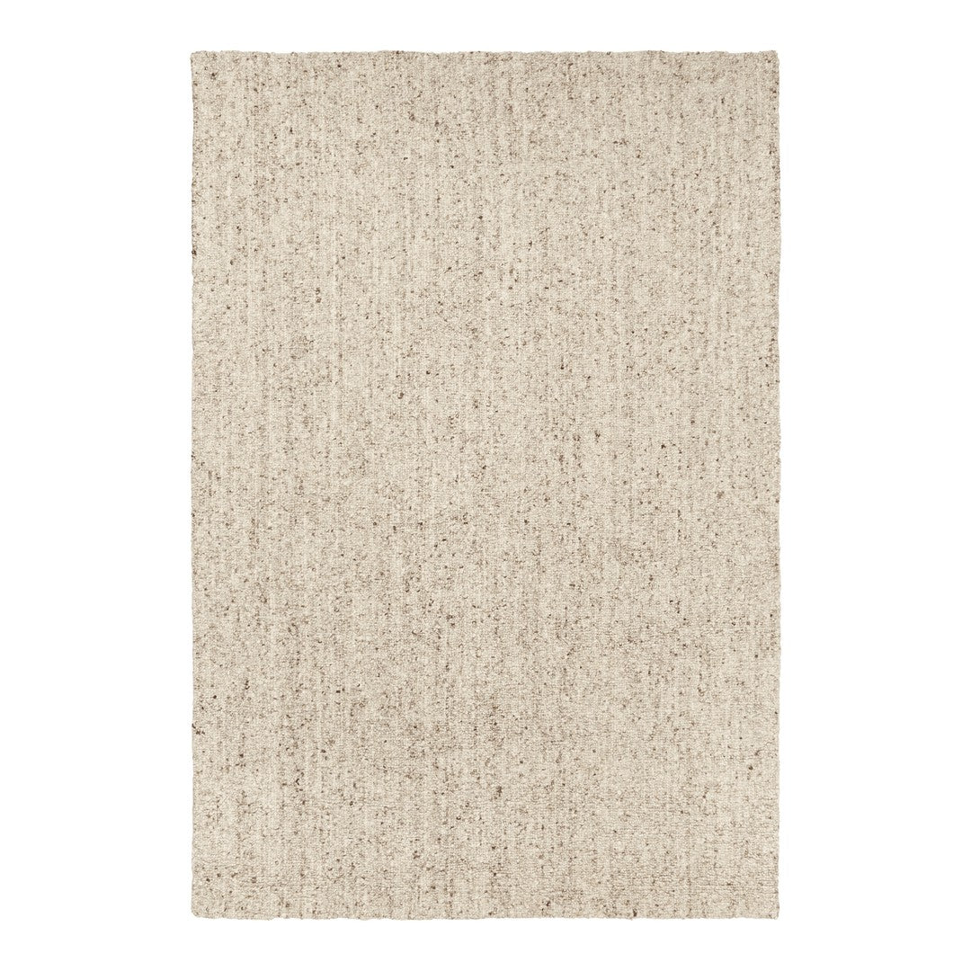 Beige area rug with subtle texture and light flecks for a warm, neutral addition to any decor.