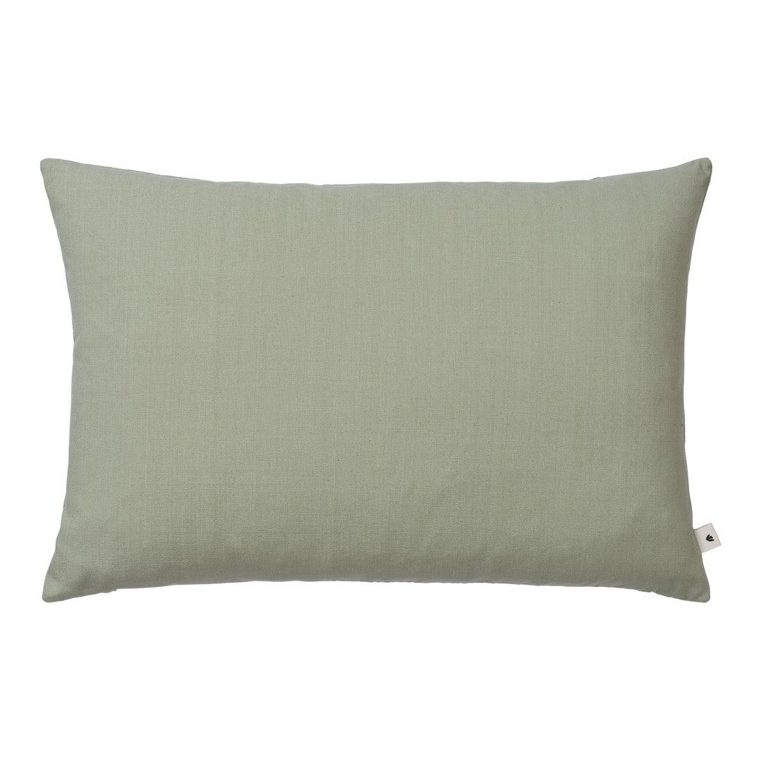 Solid sage green pillow with a smooth texture, perfect for adding a touch of elegance to any decor.
