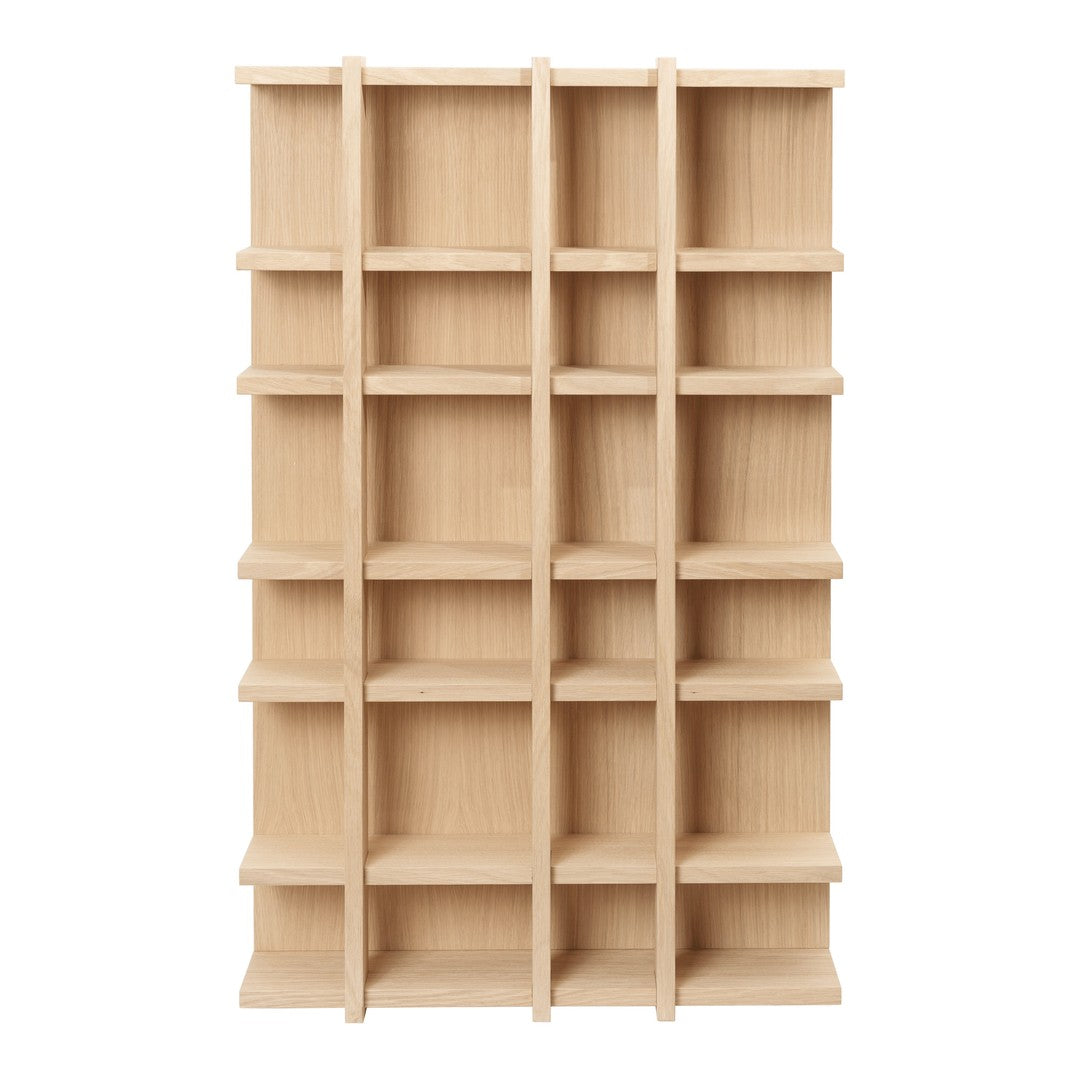 Light wooden shelving unit with a natural finish and a simple, grid-like pattern of compartments.