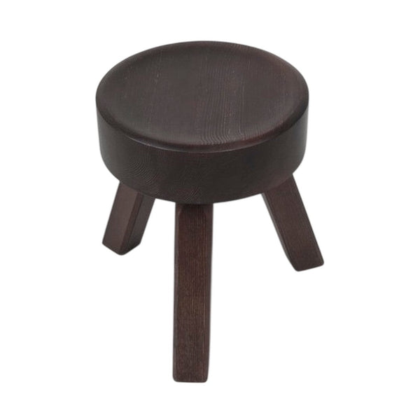 Dark wooden stool with a smooth round top and three tapered legs, showcasing a rich, deep brown finish.