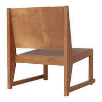 Minimalist wooden chair in warm honey brown finish with smooth, natural grain pattern. Perfect for modern decor.