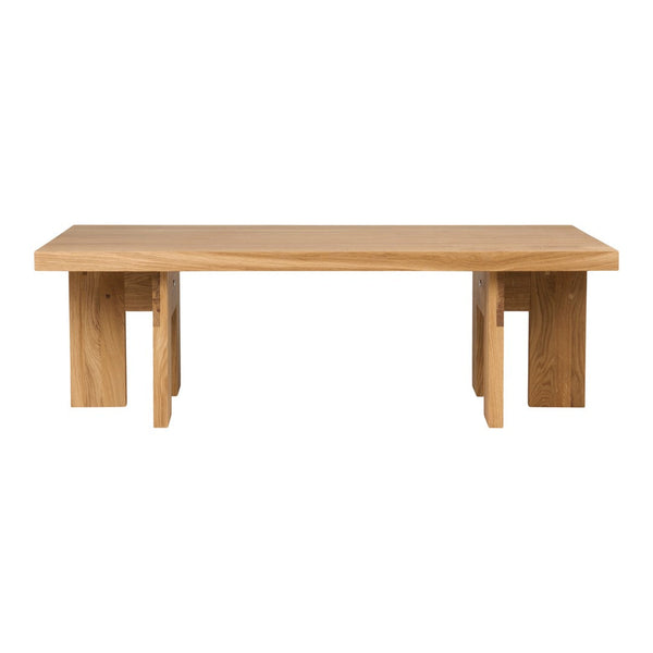 Light oak coffee table with a simple, clean design and smooth surface, featuring natural wood grain patterns.