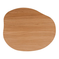 Light wood placemat with a smooth, natural grain and an organic, irregular shape. Ideal for modern dining.