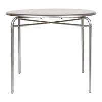 Round silver table with a sleek metal frame and smooth, reflective surface, perfect for modern decor.