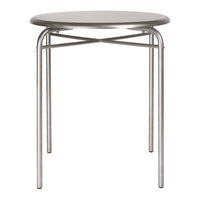 Silver round table with a minimalist design and crisscross metal legs, perfect for modern interiors.