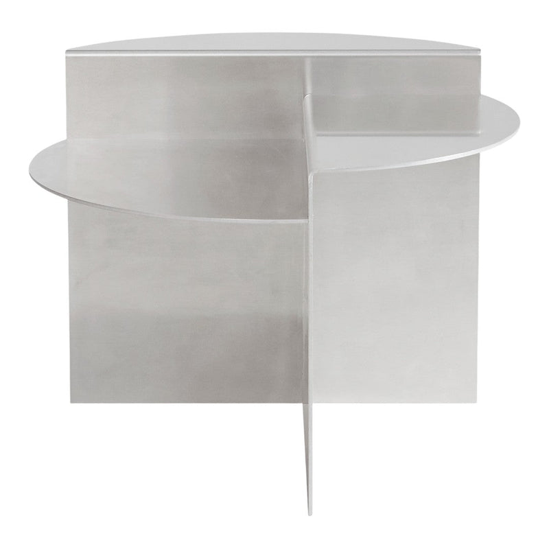 Sleek silver circular side table with a minimalist design and geometric shapes. Ideal for modern decor.