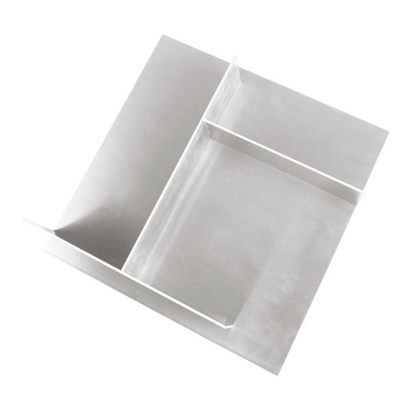 Modern silver stainless steel serving tray with sleek, minimalist design and angular patterns. Perfect for stylish dining.