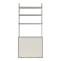 "Modern metal shelving unit with a sleek silver finish and a neutral cream base, featuring clean lines and minimal design."