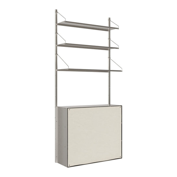 Modern shelving unit with a sleek silver frame and soft beige storage compartment, featuring minimalist design elements.