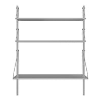 Gray metal shelving unit with three open shelves and minimalist design. Perfect for modern interiors.