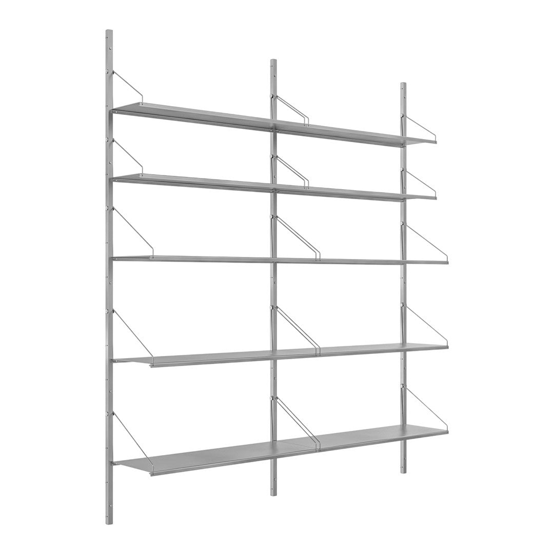 Sleek, modern shelving unit in light grey with minimalist design and open shelf patterns for stylish organization.