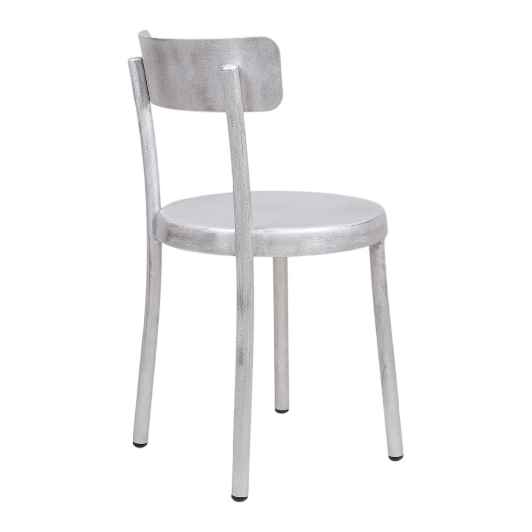 Silver metal chair with a smooth, brushed finish and minimalist design. Perfect for modern decor.
