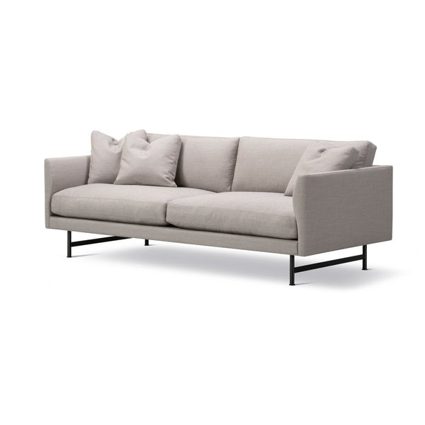 Light grey fabric sofa with a minimalist design and plush cushions, featuring a sleek black metal frame.