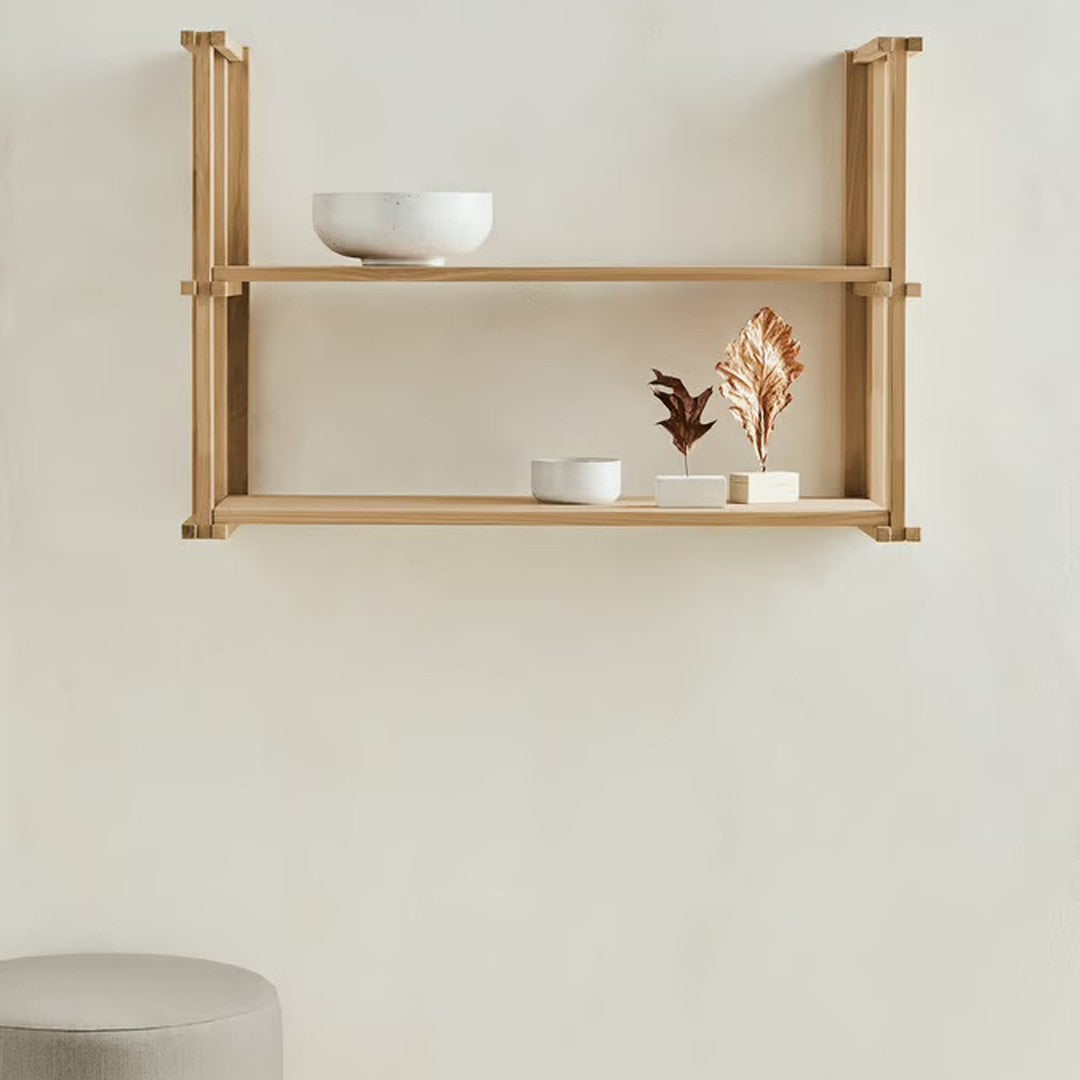 Natural wooden shelf in light beige with minimalistic white bowls and decorative plants. Clean, modern aesthetic.