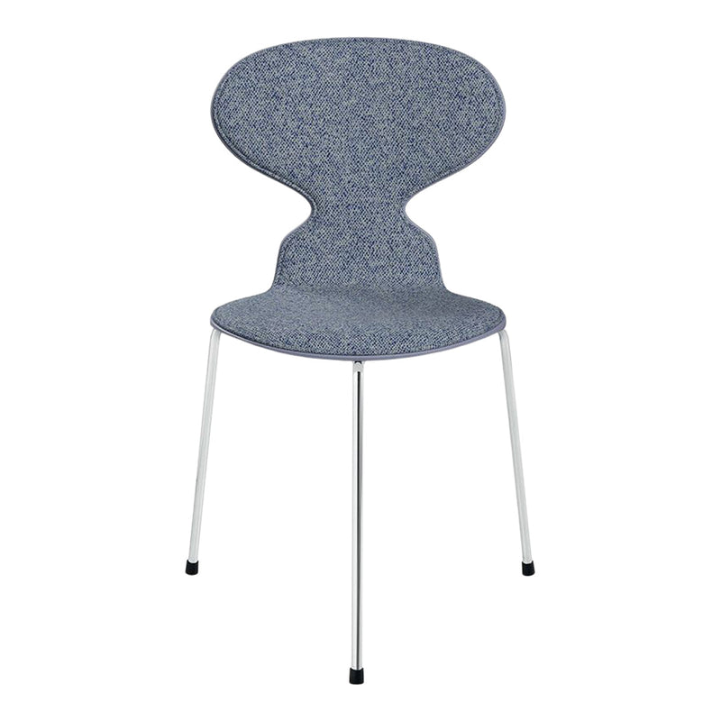 Blue patterned chair with a unique shape and sleek metal legs, perfect for modern decor.