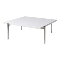 Modern square coffee table with a sleek white surface and stainless steel legs. Minimalist design.