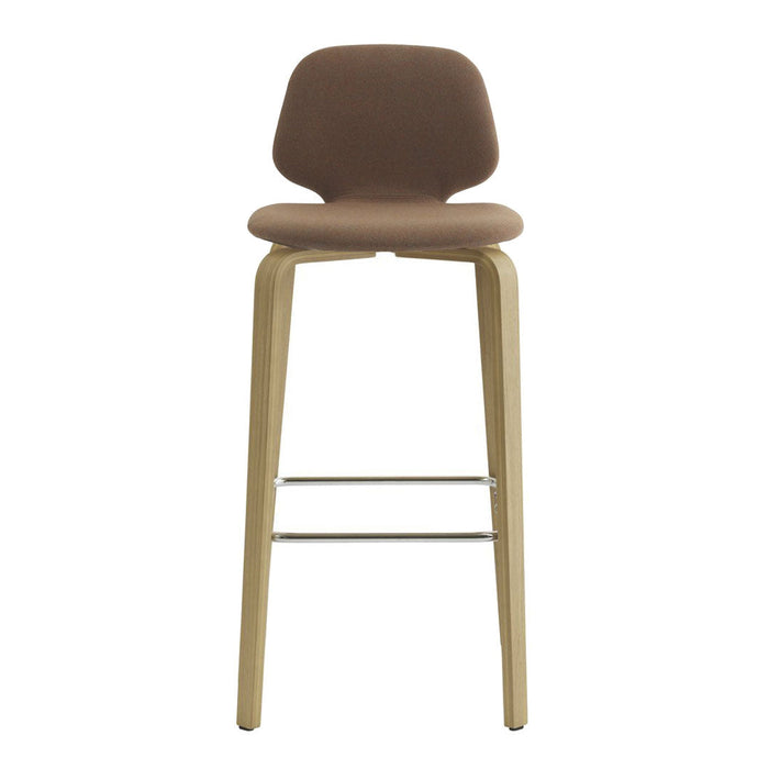 Brown upholstered stool with wooden legs and a minimalist design; perfect for modern decor.