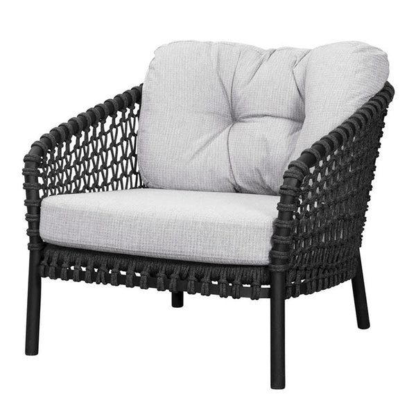 Black woven chair with soft gray cushions, featuring a textured pattern and contemporary design.