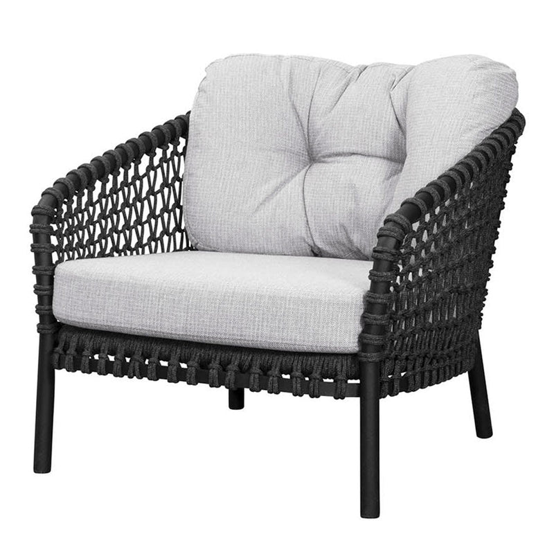 Black woven chair with soft gray cushions, featuring a textured pattern and contemporary design.