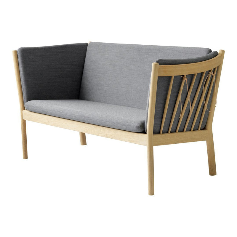 Contemporary two-tone gray and light wood sofa with a stylish diagonal slat design on the backrest.