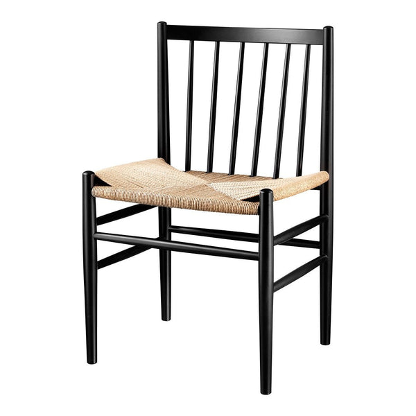 Black wooden chair with a natural woven seat, showcasing a minimalist design and contrasting textures.