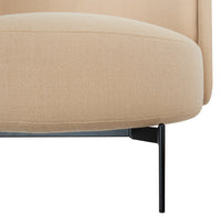 Beige textured upholstery with subtle horizontal lines and sleek black metal legs. 