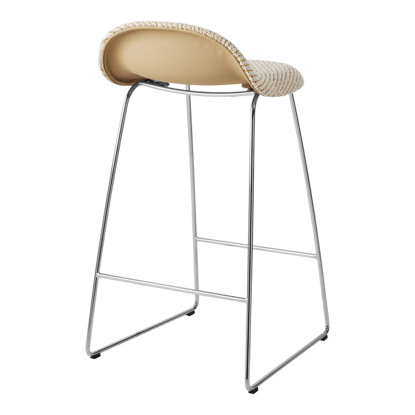 Beige stool with a patterned cream backrest and sleek chrome legs, ideal for modern decor.