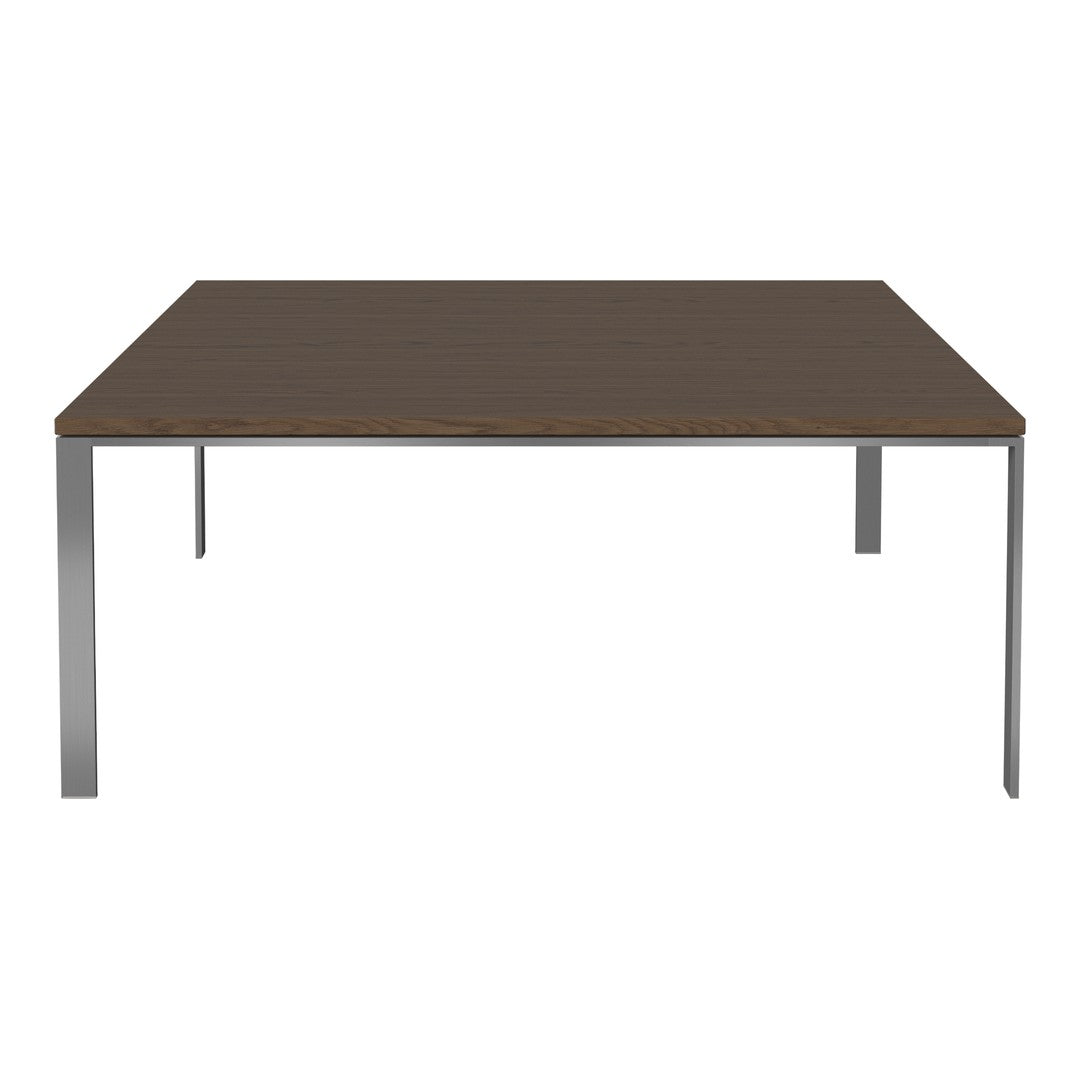 Brown wood tabletop with sleek silver metal legs, featuring a minimalist design and clean lines. Perfect for modern decor.