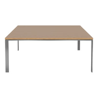Square table with a light wooden top and sleek silver metal legs, showcasing a minimalist design.