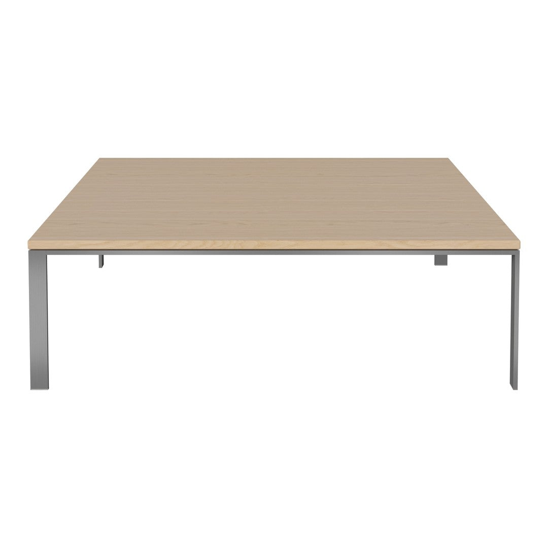 Light wood tabletop with a smooth finish and sleek metal legs for a modern look.