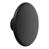 Black, smooth round knob with subtle grain pattern, perfect for modern decor. Ideal for cabinets or drawers.