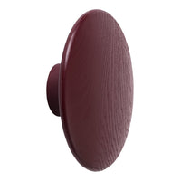 Deep burgundy round wall knob with a textured wood grain finish. Ideal for chic home decor.